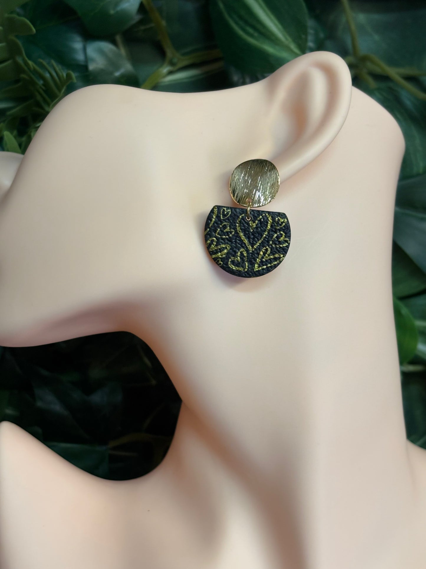 The one with the hearts black gold