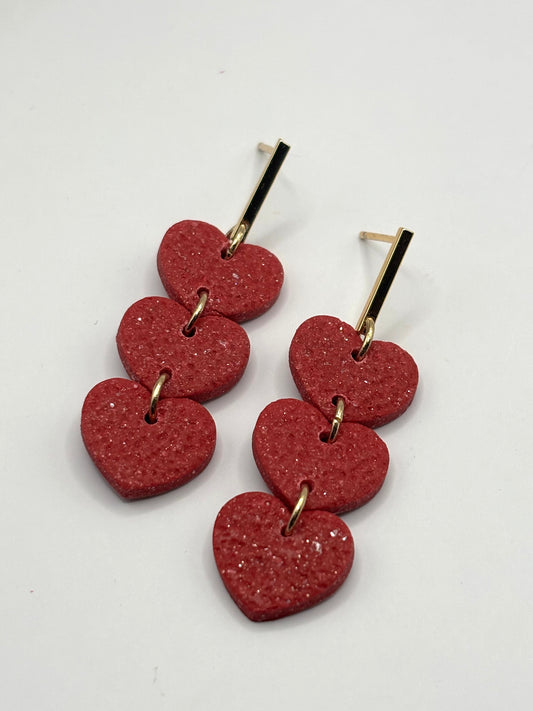 Little triple hearts red glitter